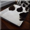 D24. Cowhide tray. 